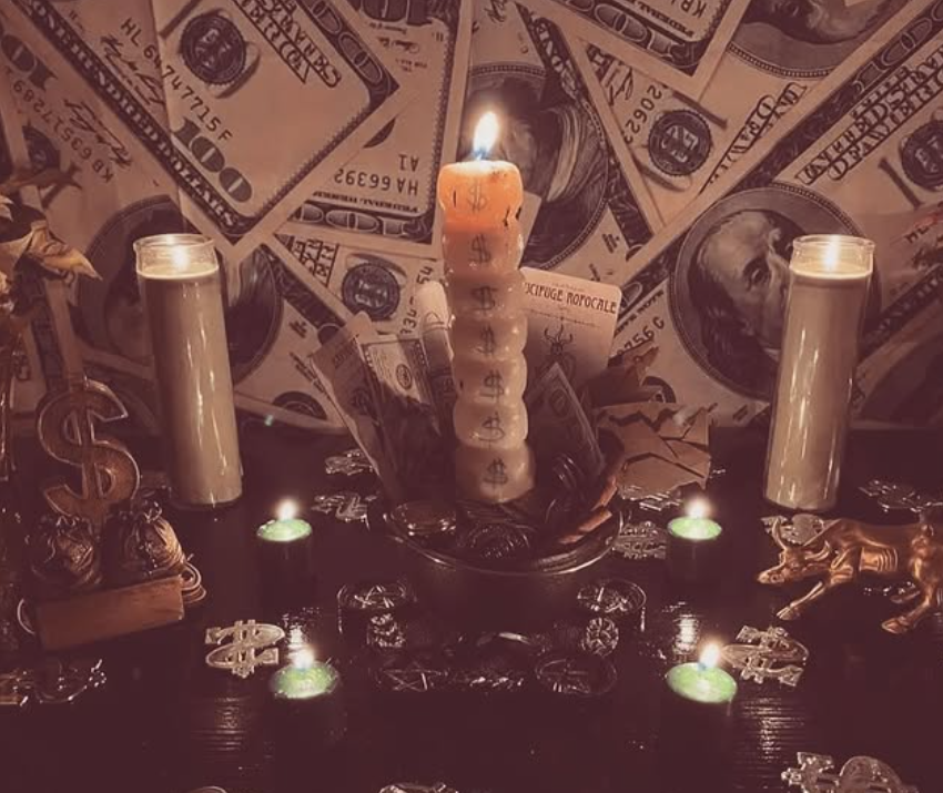 Prosperity altar with currency and candles
